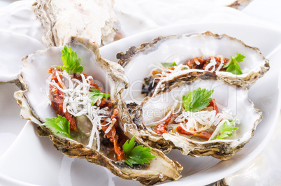 oysters with parmesan and baked tomatoes