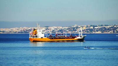Cargo Ship Anchored near Port Lisbon, Portugal timelapse