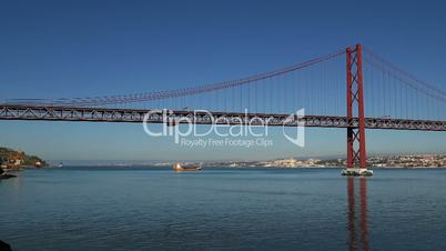 Panoramic View on the 25 de Abril Bridge in Lisbon, Portugal.