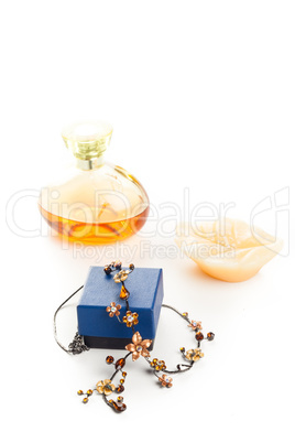 necklace perfume and candle