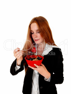 Woman enjoying breakfast.