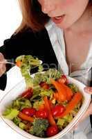 Closeup woman eating salad.