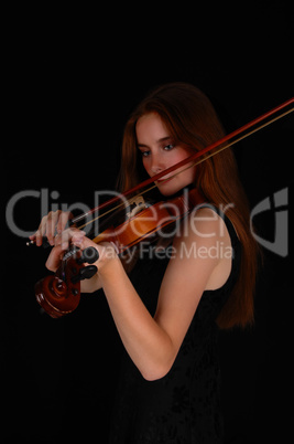 Woman playing the violin.