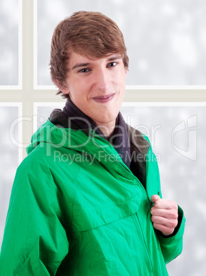 Young sporty man with winter jacket