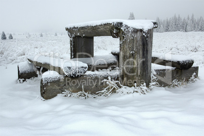 Sitting in a winter landscape