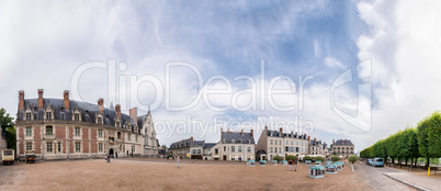 Castle of Blois along Loire river with city square