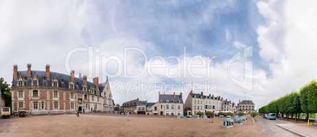 Castle of Blois along Loire river with city square