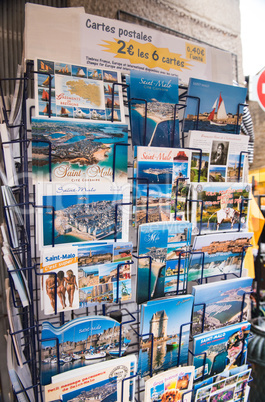SAINT MALO, FRANCE - JUNE 13, 2014: Postcards on a city street s