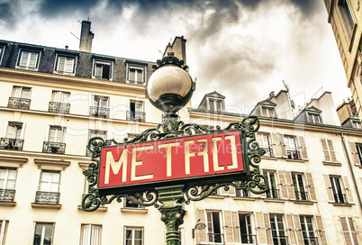 Paris, France - retro metro station sign. Subway train entrance