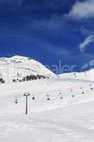 Ski resort at sunny winter day