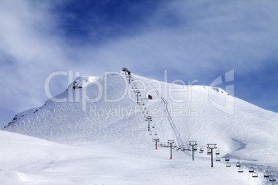 Ski slope and chair-lift at morning