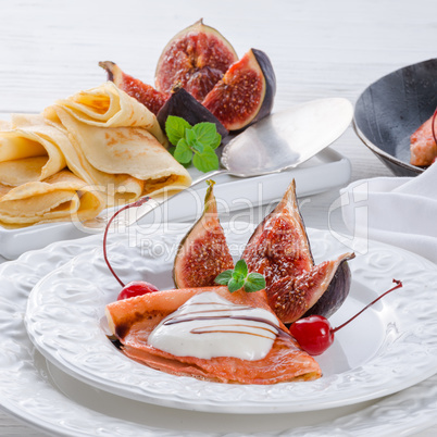 flambéed pancakes with figs and cherries