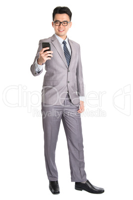 Businessman using smart phone.