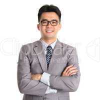 Asian business man arms folded