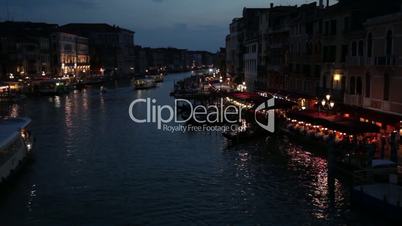 City view from Rialto bridge of night life in Venice