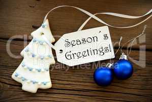 Christmas Decoration with Label with Seasons Greetings on it