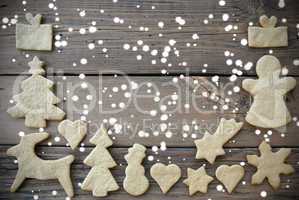 Ginger Bread Framing Wooden Background with Snow