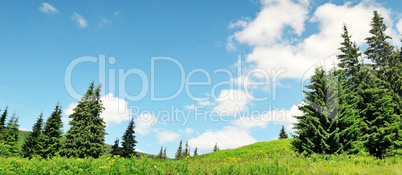 mountain peaks against the blue sky