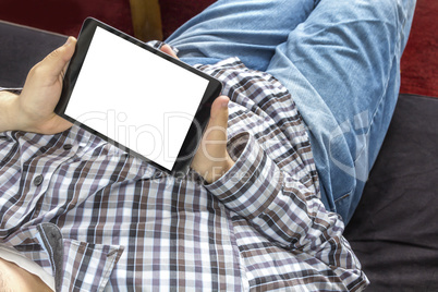 Man surfing on tablet computer