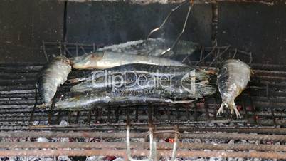 Fish Sardines Grilling on Grid, closeup