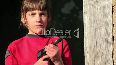 Boy with gun,boy playing weapon,little warrior.Juvenile delinquency.