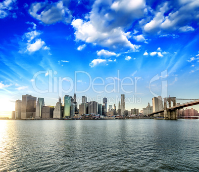 New York City. Wonderful sunset view of Brooklyn Bridge and Manh