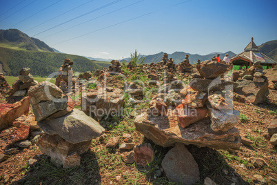 Pyramid of stones on a background of mountains