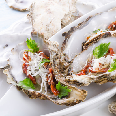 oysters with parmesan and baked tomatoes