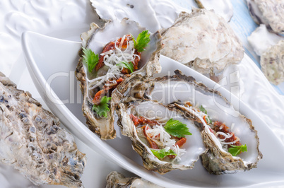 oysters with parmesan and baked tomatoes