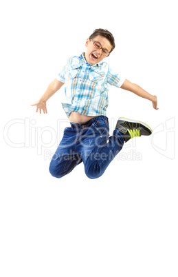 Happy little boy jumping
