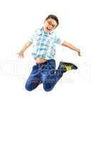 Happy little boy jumping