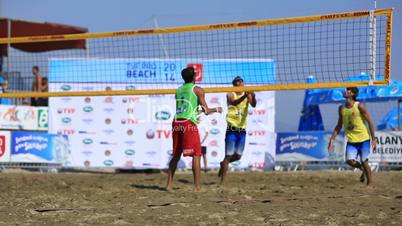 slow motion beach volleyball