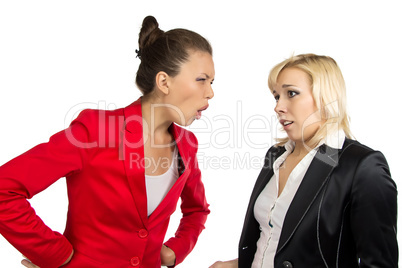 Two conflicted business women in office