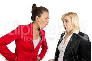 Two conflicted business women in office