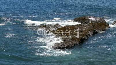 Waves Crashing on Rocks, calm weather
