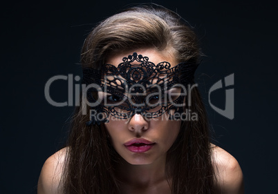 Sexual woman in lace mask