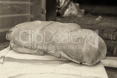 Bread in front of wood-fired oven