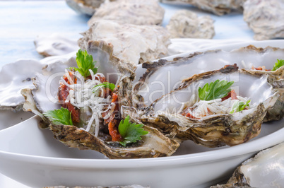 oysters with parmesan and baked tomatoes