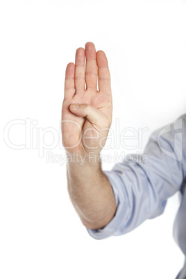 Man in a blue shirt shows four fingers