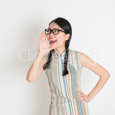 Asian Chinese female  shouting loud
