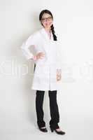 Asian Chinese female student in white lab uniform