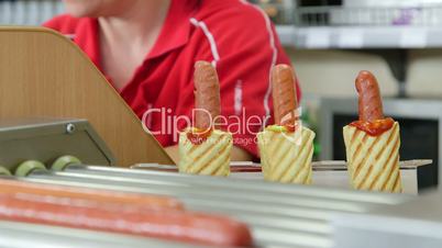 Female employee working in fast food lunch dinner