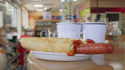 Hotdogs and drinks for lunch in petrol station convenience store