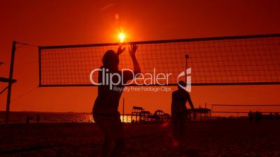 Volleyball courts on a summer sandy beach at sunset