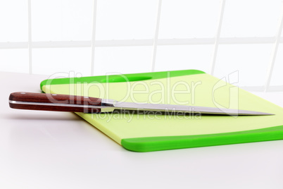 Kitchen knife and cutting board