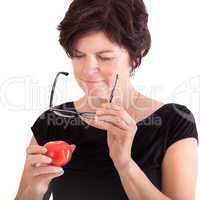 Woman checking tomato