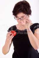 Woman checking tomato