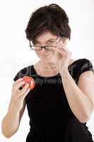 Woman checking tomato