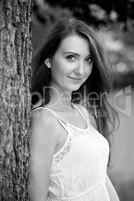 Woman standing on tree