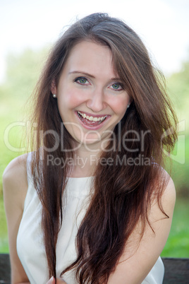 Portrait of a young laughing woman